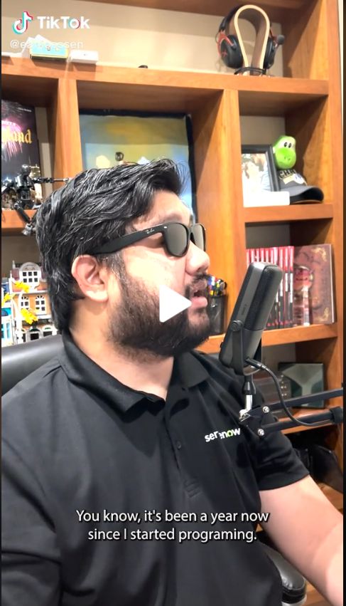 Man in home with boom mic signing on the Internet